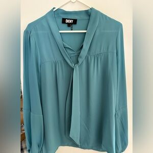 Pretty blue blouse with neck tie by DKNY. Great for work. EUC.
